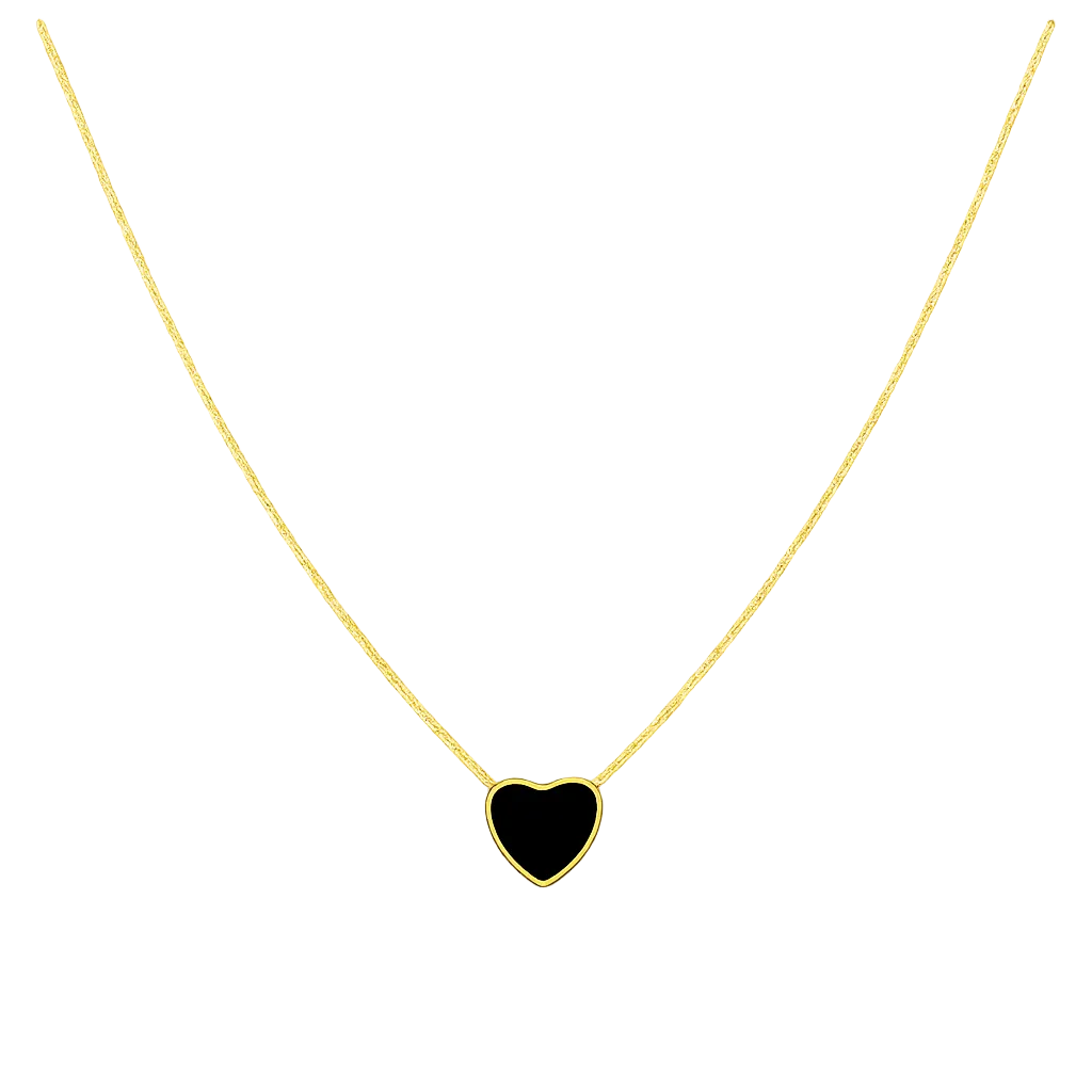 Gold necklace with a black heart pendant on a white background