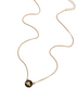 Gold necklace with a bumble bee pendant on a white background