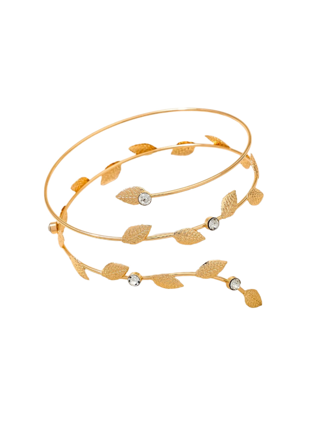 Gold bracelet with leaf designs and small stones on a beige fabric background