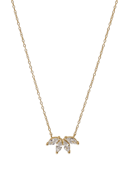 Gold necklace with a leaf-shaped pendant on a white background