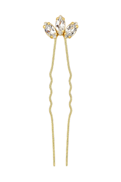 Gold hairpin with crystal-like stones on a white background