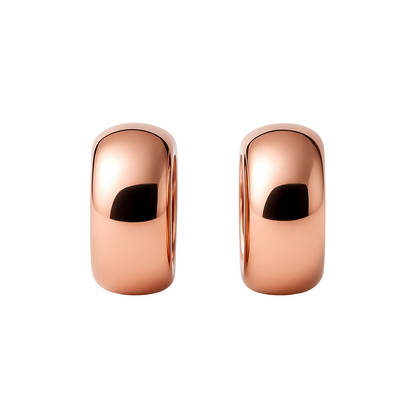 Two rose gold rings with black accents on a white background