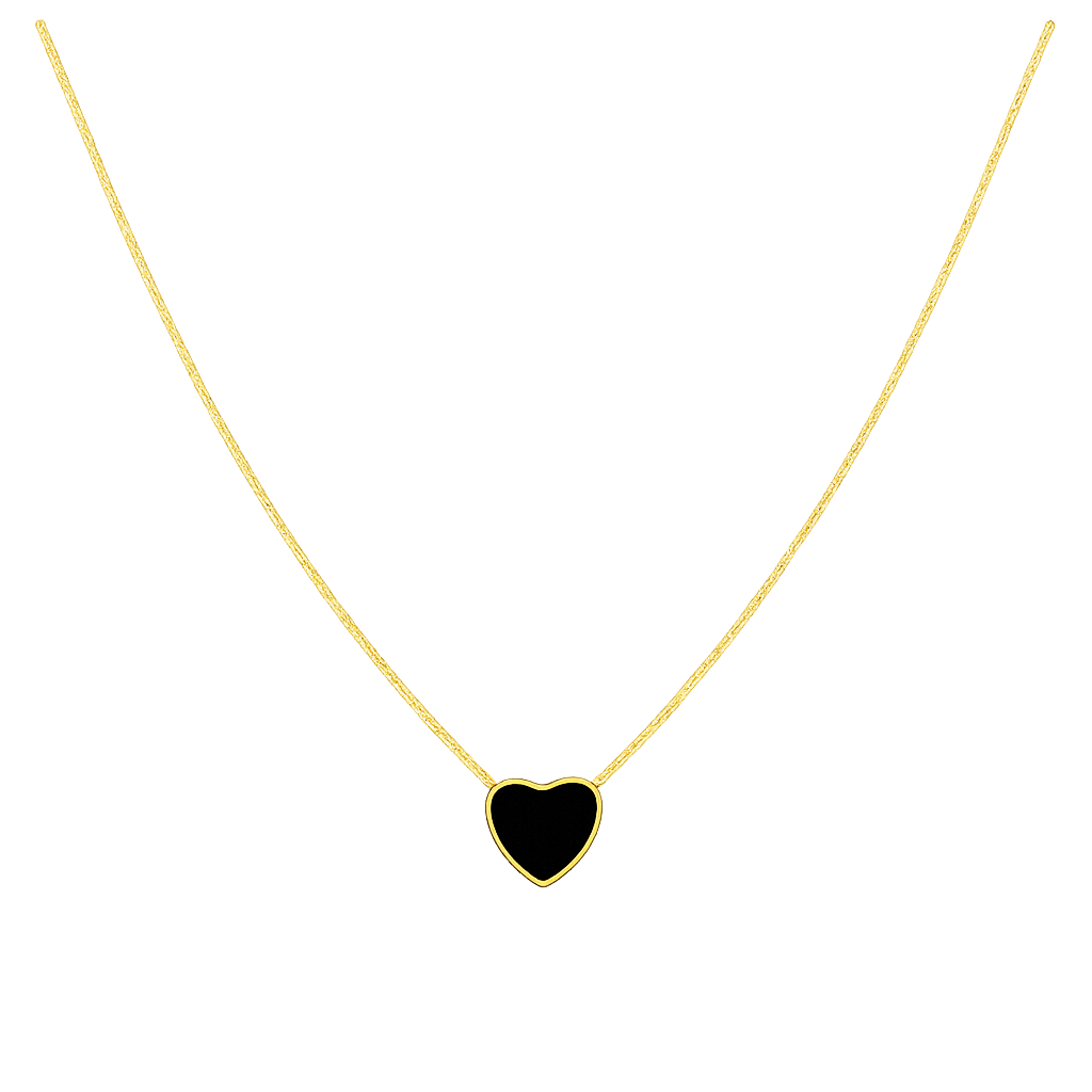 Gold necklace with a black heart pendant on a white background